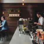 Modern third wave coffee shop with espresso bar pour over and latte art representing top coffee drinks and trends 2026