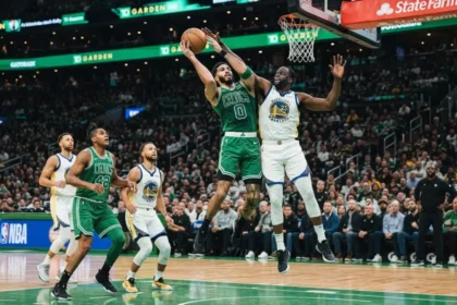 best basketball players of all time - NBA game action under bright arena lights
